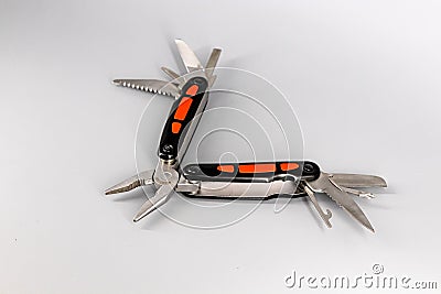 Multipurpose Tool - Multipurpose pliers, knife, screwdriver, hook, saw Stock Photo