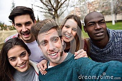 Multiracial group of friends taking selfie Stock Photo