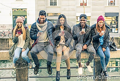 Multiracial group of people with cellphones Stock Photo