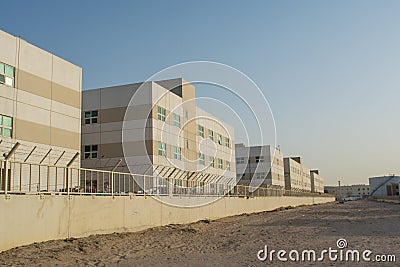 Multistorey living houses complex of the workers in Dubai Stock Photo