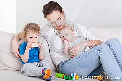 Mum with baby and preschooler Stock Photo