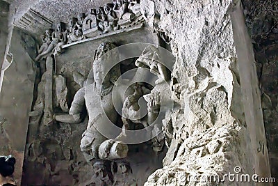 Mumbai, India: Cave sculpture, Cave Relief Sculpture, Cave art interior of Elephanta cave one of the UNESCO world heritage site Editorial Stock Photo