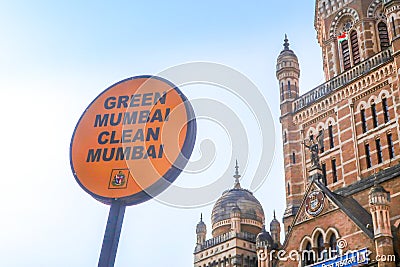 A warning sign `Green mumbai clean mumbai` campaign for people to keep city clean in Mumbai opposite Brihanmumbai Municipal Corpor Editorial Stock Photo