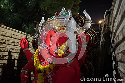 Mumbai, India - 20 september 2019: close up of red hindu god ganesha inside truck during Vinayaka Chaturthi festival celebration Editorial Stock Photo