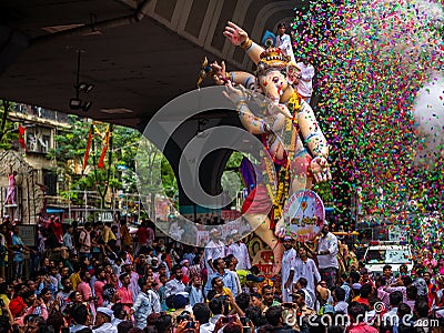 Thousands of devotees bid adieu to tallest Lord Ganesha in Mumbai during Ganesh Visarjan which marks the end of the ten-day-long Editorial Stock Photo