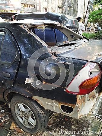 A damaged car in a road accident, Rear and back side of a car. Editorial Stock Photo