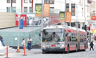 Muni bus outside the Chinatown Rose Pak station. Celebrating 50 years Editorial Stock Photo