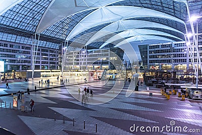 Munich airport center interior twilight Editorial Stock Photo