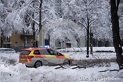 Emergency medical service operation on snow-covered roads. Emergency vehicle Editorial Stock Photo