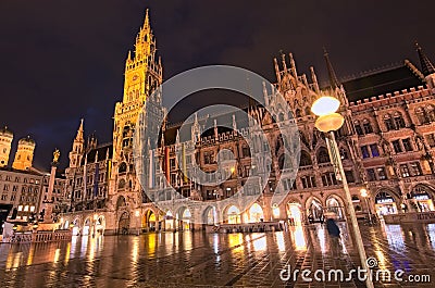 The evening view of New Town Hall at the Marienplatz after spring rain. Editorial Stock Photo