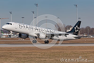 Air Dolomiti Star Aliance Embraer E190 airplane at Munich airport Editorial Stock Photo