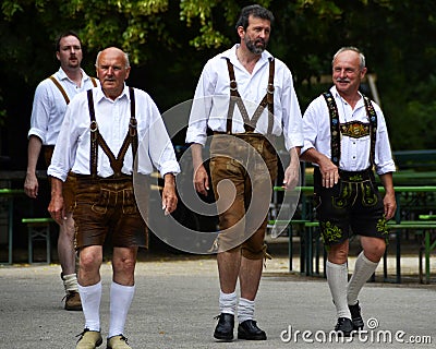 Biergarten beer garden is the most famous beer hall in Munich. Editorial Stock Photo