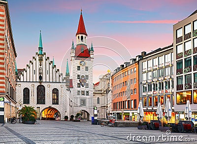 Munich - Germany, Marienplatz at dramtic sunrise with red clouds - nobody Stock Photo