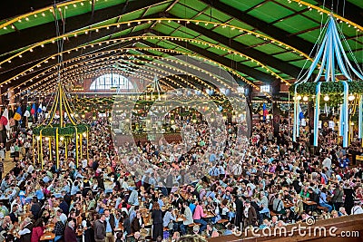 MUNICH, GERMANY - 25 SEPTEMBER 2014: Oktoberfest,Bavaria, Munich, People at the Oktoberfest,The Oktoberfest is the biggest beer Editorial Stock Photo