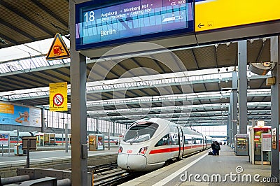 MUNICH, JAN, 12, 2013: Main railway station. ICE electric passenger high speed intercity train ready to run to Berlin. High speed Editorial Stock Photo