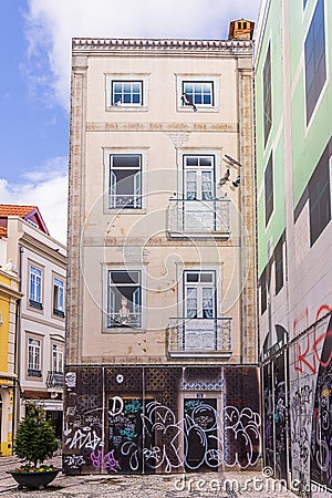 Mural of apartment windows and balconies on a building in Aveiro Editorial Stock Photo
