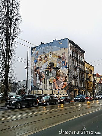 A mural commemorating the artist Sylwester Checinski over busy road Editorial Stock Photo