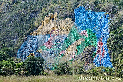 Mural de la Prehistoria The Mural of Prehistory painted on a cliff face in the Vinales valley, Cuba Editorial Stock Photo