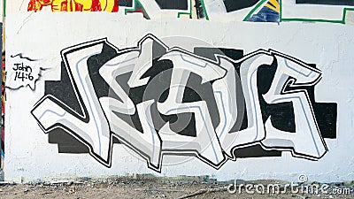 Mural featuring Jesus name in graffiti style in the Fabrication Yard in Dallas, Texas. Editorial Stock Photo