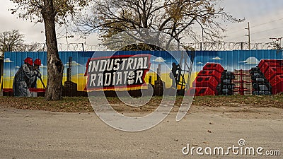 Mural flanking one side of the entrance to Industrial Radiator Service in West Dallas, Texas. Editorial Stock Photo