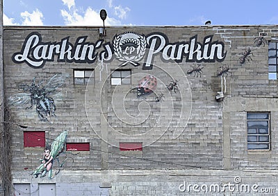 Mural with insects on the alleyway side of Larkin's Parkin in Benson at 6120 Military Avenue. Editorial Stock Photo
