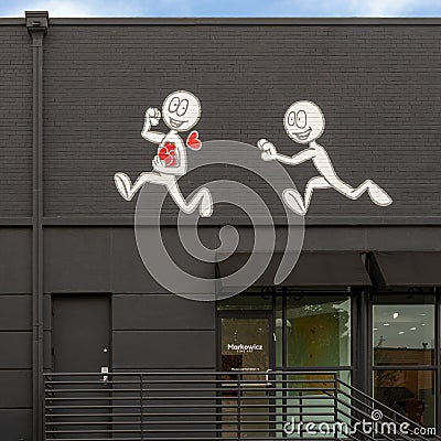 Mural by Kai featuring his Imaginary Friend on an outside wall of Markowicz Fine Art in Dallas, Texas. Editorial Stock Photo