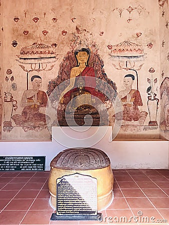 Mural painting and four Buddha footprints stacked together in the sanctuary of Buppharam temple Wat Buppharam or Wat Plai Khlong Editorial Stock Photo