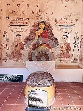 Mural painting and four Buddha footprints stacked together in the sanctuary of Buppharam temple Wat Buppharam or Wat Plai Khlong Editorial Stock Photo