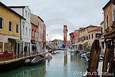 Murano canal and central street of Murano with shops and restaurants Editorial Stock Photo