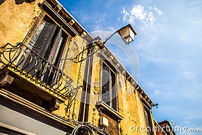 MURANO, ITALY - AUGUST 19, 2016: Famous architectural monuments and colorful facades of old medieval buildings close-up Stock Photo