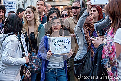 Murcia September 2012, young woman holding a sign that says I want a decent future in a demonstration. Spain Editorial Stock Photo