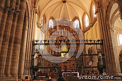 Arches,pillars and altarpiece of the cathedral of Murcia Editorial Stock Photo