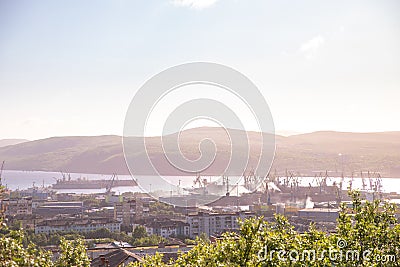 Murmansk, Russia - July 1, 2019: Panorama northern city. Cargo Port gulf of sea. Blue sky Editorial Stock Photo