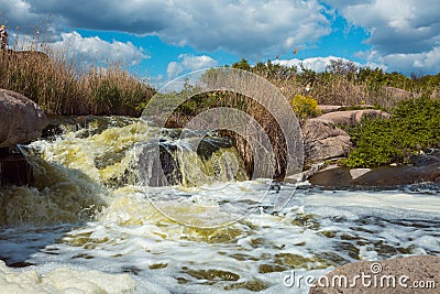 The murmuring waters of the Tokovsky waterfall in Ukraine. Stock Photo