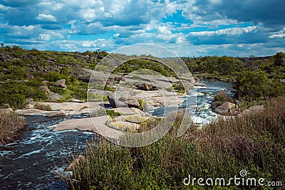 The murmuring waters of the Tokovsky waterfall in Ukraine. Stock Photo