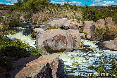 The murmuring waters of the Tokovsky waterfall in Ukraine. Stock Photo