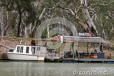 Murray River, South Australia - Jun 3 2006: Floating river bank hotel on the Murray River. Wineries and hotels are common Editorial Stock Photo