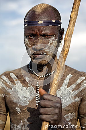 Mursi warrior in South Omo, Ethiopia Editorial Stock Photo