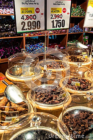Various sweet dates and nuts in grocery supermarket in the capital Muscat. Sultanate of Oman Editorial Stock Photo