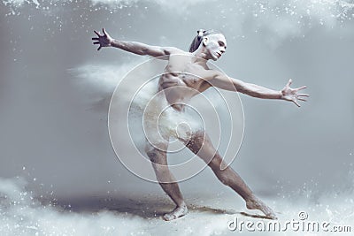 Muscle man dancer in dust / fog Stock Photo