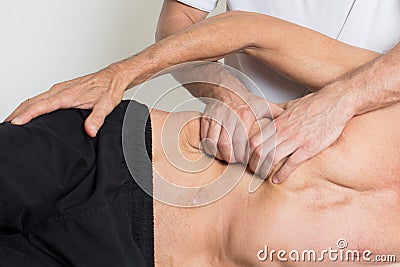 Muscle tissue massage Stock Photo