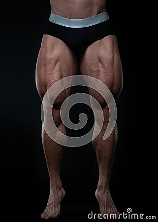 Muscled legs Stock Photo