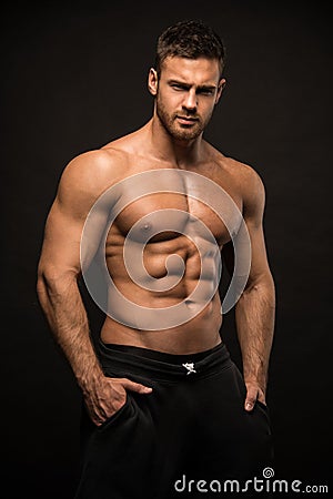 Muscled male model Konstantin Kamynin Stock Photo