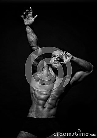 Muscled male model Konstantin Kamynin Stock Photo