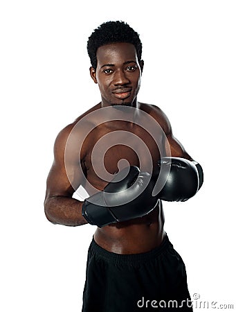 Muscular african boxer posing in style Stock Photo