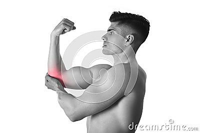 Muscular body man holding elbow sore in pain in body health care and sport medicine Stock Photo