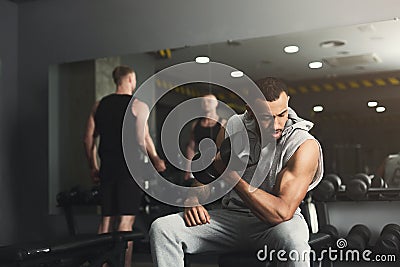 Muscular bodybuilder doing heavy deadlifts at gym Stock Photo