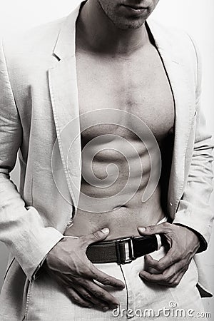Muscular man with abs and suit Stock Photo
