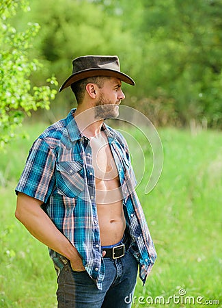 Muscular ranch man in cowboy hat. sexy farmer relax. farming and agriculture cultivation. time for break. Eco farm Stock Photo