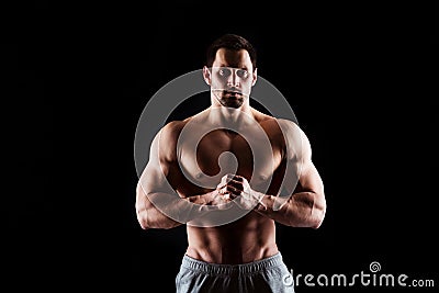 Muscular and torso of young man having perfect abs, bicep and chest. Male hunk with athletic body. Fitness concept Stock Photo